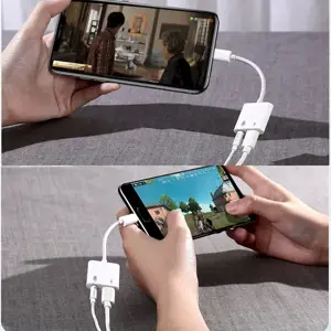 Joyroom universal Lightning adapter - 3.5mm mini jack with charging port white (S-Y105)